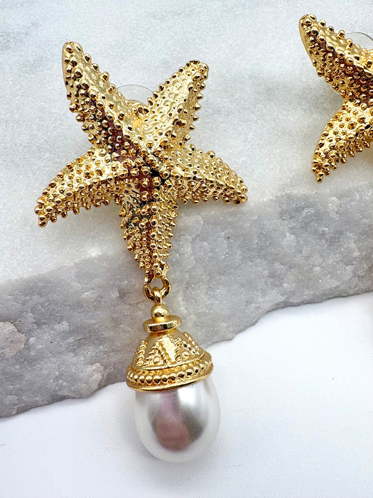 Gold starfish earrings with pearl 